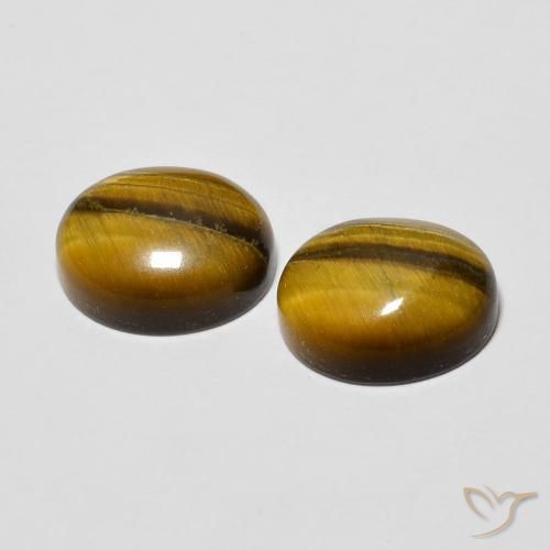 Shop natural 6.15ct Marron jaunâtre Œil de tigre gems, ovale, from Thaïlande at GemSelect. In stock, global shipping!