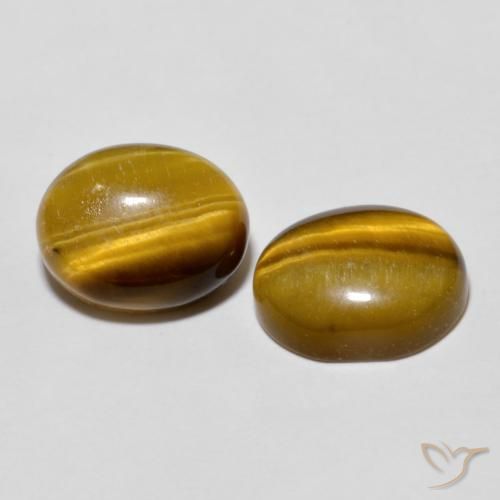Shop natural 5.60ct Marron clair Œil de tigre gems, ovale, from Thaïlande at GemSelect. In stock, global shipping!