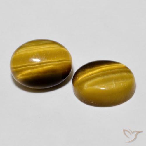 Shop natural 5.72ct Brun doré Œil de tigre gems, ovale, from Thaïlande at GemSelect. In stock, global shipping!