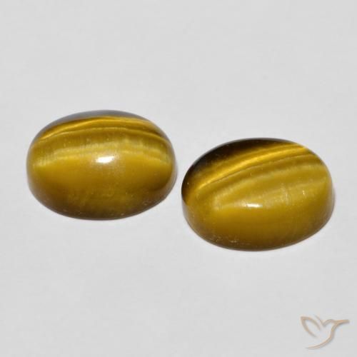 Shop natural 5.72ct Brun doré Œil de tigre gems, ovale, from Thaïlande at GemSelect. In stock, global shipping!