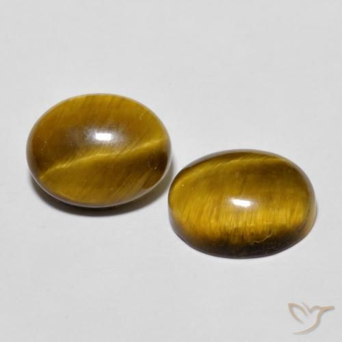 Shop natural 5.85ct Marron jaunâtre Œil de tigre gems, ovale, from Thaïlande at GemSelect. In stock, global shipping!
