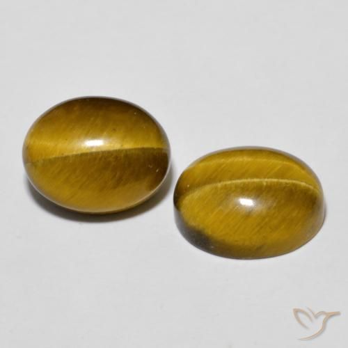 Shop natural 6.22ct Brun doré Œil de tigre gems, ovale, from Thaïlande at GemSelect. In stock, global shipping!