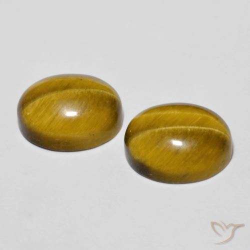 Shop natural 6.22ct Brun doré Œil de tigre gems, ovale, from Thaïlande at GemSelect. In stock, global shipping!