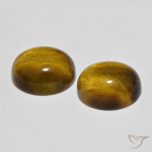 Shop natural 6.95ct Marron chaud Œil de tigre gems, ovale, from Thaïlande at GemSelect. In stock, global shipping!