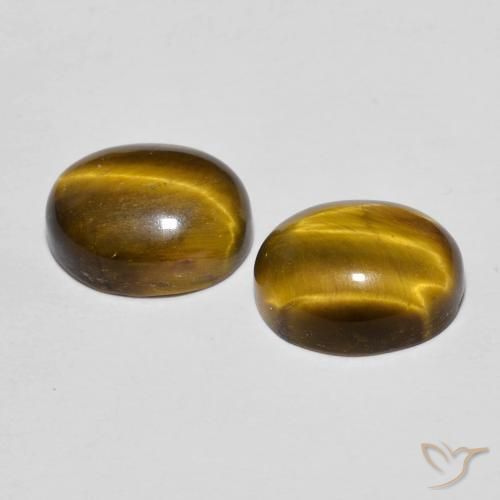 Shop natural 6.06ct Brun doré Œil de tigre gems, ovale, from Thaïlande at GemSelect. In stock, global shipping!