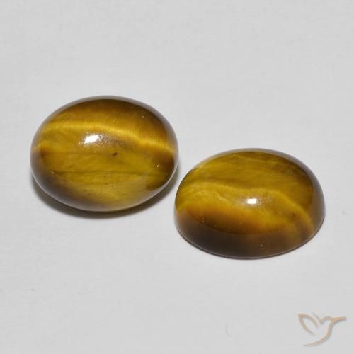 Shop natural 6.11ct Brun doré Œil de tigre gems, ovale, from Thaïlande at GemSelect. In stock, global shipping!