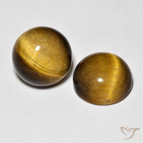 Shop natural 8.38ct Marron jaunâtre Œil de tigre gems, Tour, from Thaïlande at GemSelect. In stock, global shipping!
