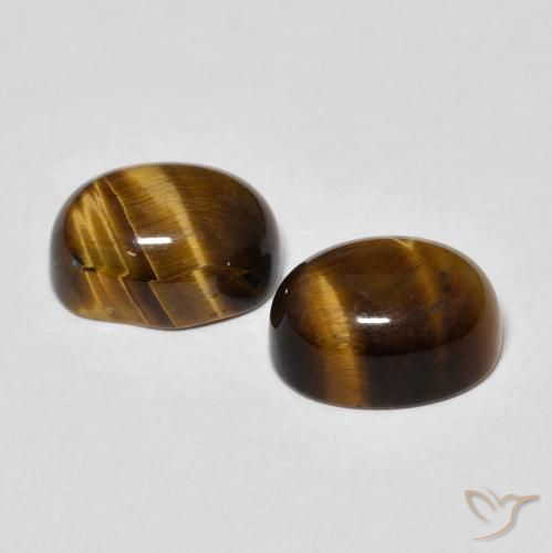 Shop natural 4.72ct Marron chaud Œil de tigre gems, ovale, from Thaïlande at GemSelect. In stock, global shipping!