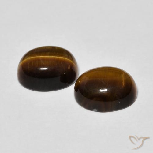 Shop natural 4.43ct Brun moyen Œil de tigre gems, ovale, from Thaïlande at GemSelect. In stock, global shipping!