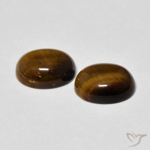 Shop natural 3.60ct Brun doré Œil de tigre gems, ovale, from Thaïlande at GemSelect. In stock, global shipping!