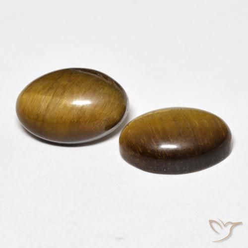 Shop natural 7.73ct Brun doré Œil de tigre gems, ovale, from Thaïlande at GemSelect. In stock, global shipping!
