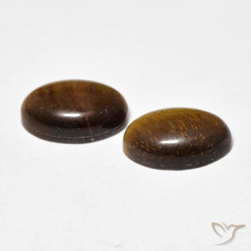 Shop natural 7.36ct Medium Dark-Brown Œil de tigre gems, ovale, from Thaïlande at GemSelect. In stock, global shipping!