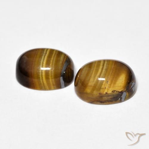 Shop natural 4.81ct Brun moyen Œil de tigre gems, ovale, from Thaïlande at GemSelect. In stock, global shipping!