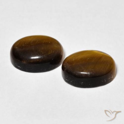 Shop natural 5.80ct Brun doré Œil de tigre gems, ovale, from Thaïlande at GemSelect. In stock, global shipping!