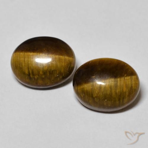 Shop natural 6.24ct Marron chaud Oeil de Tigre gems, ovale, from Thaïlande at GemSelect. In stock, global shipping!