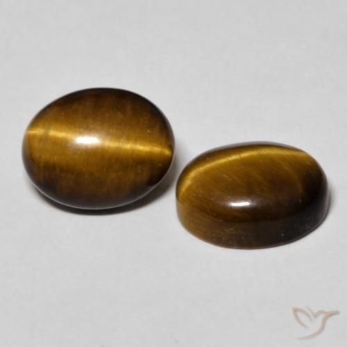 Shop natural 6.10ct Brun pain d'épices Œil de tigre gems, ovale, from Thaïlande at GemSelect. In stock, global shipping!