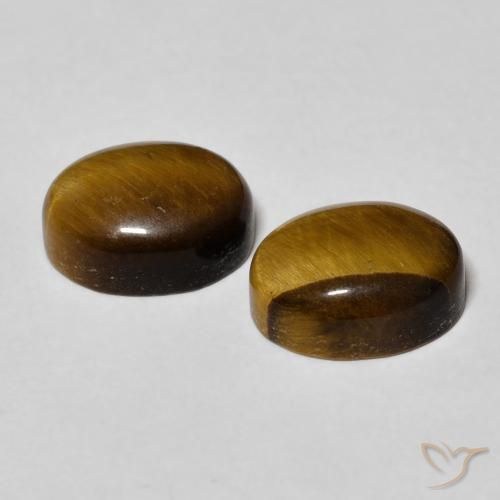 Shop natural 6.17ct Marron jaunâtre Œil de tigre gems, ovale, from Thaïlande at GemSelect. In stock, global shipping!