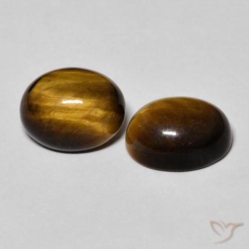 Shop natural 6.34ct Brun doré Œil de tigre gems, ovale, from Thaïlande at GemSelect. In stock, global shipping!
