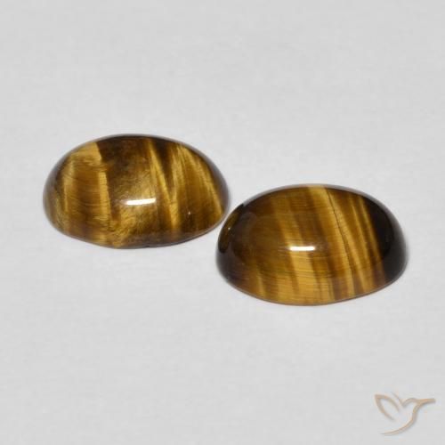 Shop natural 2.30ct Brun doré Œil de tigre gems, ovale, from Thaïlande at GemSelect. In stock, global shipping!