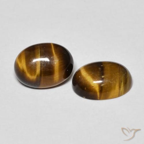 Shop natural 2.40ct Marron jaunâtre Œil de tigre gems, ovale, from Thaïlande at GemSelect. In stock, global shipping!