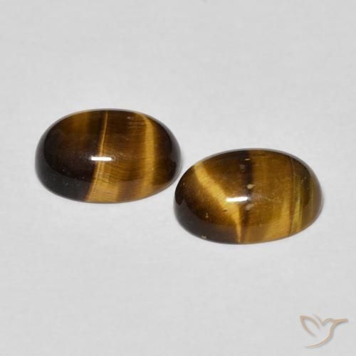 Shop natural 2.40ct Marron jaunâtre Œil de tigre gems, ovale, from Thaïlande at GemSelect. In stock, global shipping!