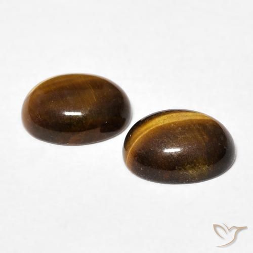 Shop natural 2.44ct Brun doré Œil de tigre gems, ovale, from Thaïlande at GemSelect. In stock, global shipping!