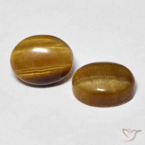 Shop natural 6.08ct Marron chaud Œil de tigre gems, ovale, from Thaïlande at GemSelect. In stock, global shipping!