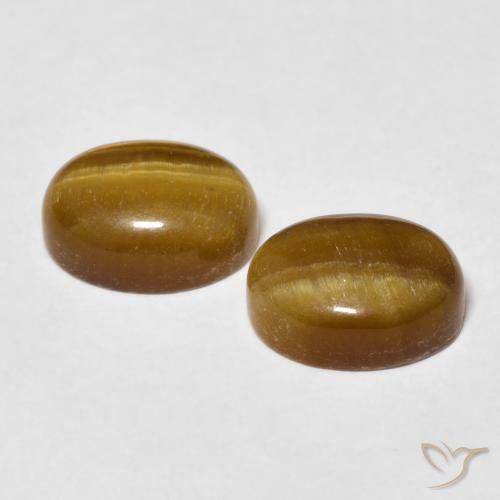 Shop natural 6.08ct Marron chaud Œil de tigre gems, ovale, from Thaïlande at GemSelect. In stock, global shipping!