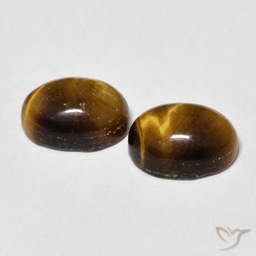 Shop natural 3.34ct Marron jaunâtre Œil de tigre gems, ovale, from Thaïlande at GemSelect. In stock, global shipping!