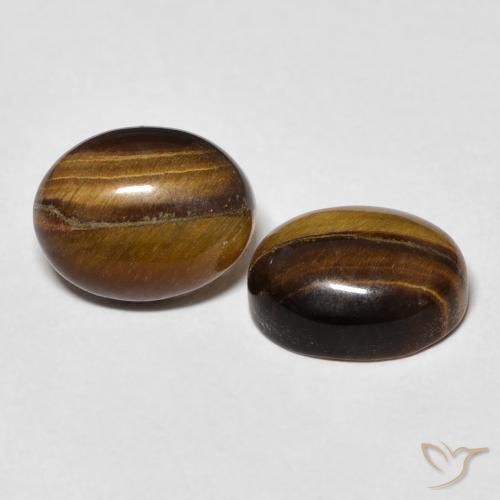Shop natural 6.10ct Brun moyen Œil de tigre gems, ovale, from Thaïlande at GemSelect. In stock, global shipping!