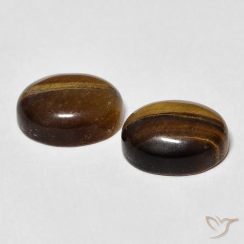 Shop natural 6.10ct Brun moyen Œil de tigre gems, ovale, from Thaïlande at GemSelect. In stock, global shipping!
