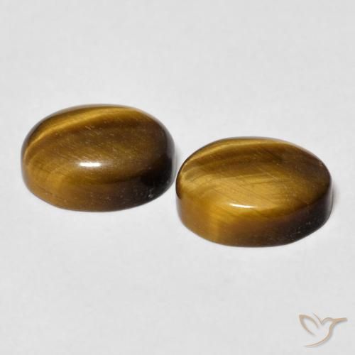 Shop natural 5.92ct Marron chaud Œil de tigre gems, ovale, from Thaïlande at GemSelect. In stock, global shipping!
