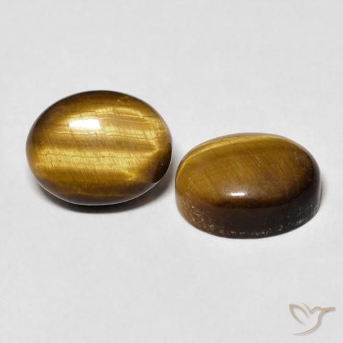 Shop natural 6.38ct Brun doré Œil de tigre gems, ovale, from Thaïlande at GemSelect. In stock, global shipping!