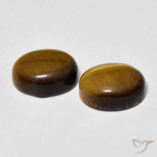 Shop natural 6.38ct Brun doré Œil de tigre gems, ovale, from Thaïlande at GemSelect. In stock, global shipping!