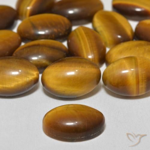 Œil de tigre Marron chaud naturelle ovale, 3.79 ct, Opaque