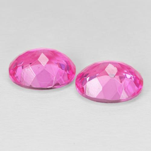 Shop natural 9.35ct Magenta profond Topaze gems, ovale, from Brésil at GemSelect. In stock, global shipping!