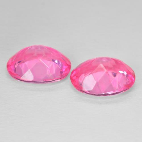 Shop natural 10.97ct Magenta profond Topaze gems, ovale, from Brésil at GemSelect. In stock, global shipping!