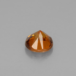 Zircon orange naturelle coupe roude, 0,60 ct, VVS