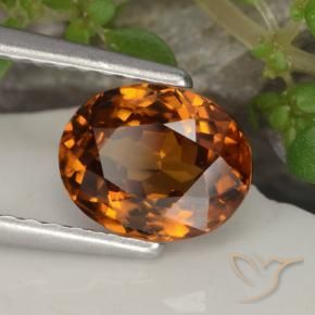 Zircon Orange rougeâtre naturelle ovale, 1.68 ct, VVS