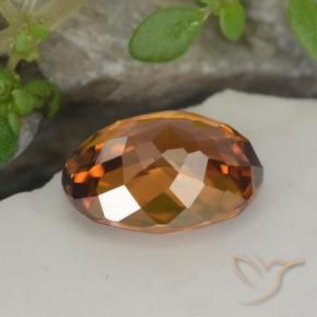 Zircon Orange rougeâtre naturelle ovale, 1.68 ct, VVS