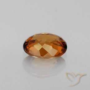 Zircon Orange brunâtre foncé naturelle ovale, 1.46 ct, VVS