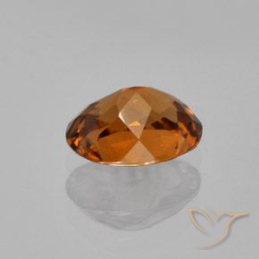 Zircon Orange foncé naturelle ovale, 1.53 ct, VVS