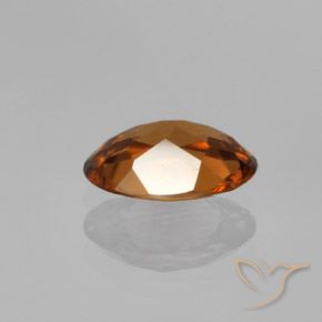Zircon Orange foncé naturelle ovale, 1.49 ct, VVS