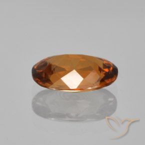 Zircon Orange brunâtre foncé naturelle ovale, 1.67 ct, VVS-VS