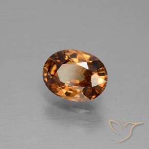 Zircon Orange foncé naturelle ovale, 1.98 ct, VS