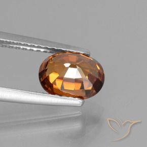 Zircon Orange moyen-foncé naturelle ovale, 2.47 ct, VS