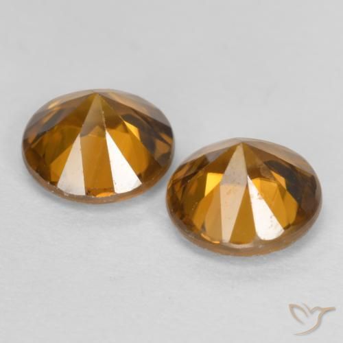 Shop natural 2.32ct Orange moyen-foncé Zircon gems, Tour, from Cambodge at GemSelect. In stock, global shipping!