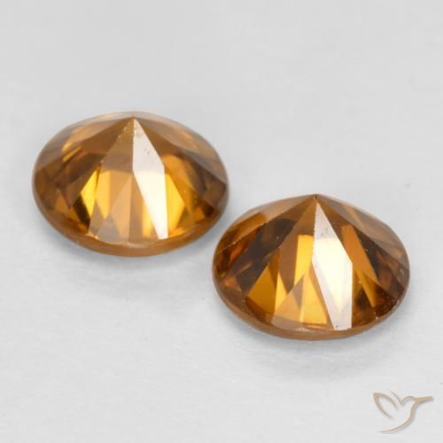 Shop natural 2.14ct Orange foncé Zircon gems, Tour, from Cambodge at GemSelect. In stock, global shipping!