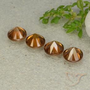 Shop natural 4.75ct Orange moyen-foncé Zircon gems, Tour, from Cambodge at GemSelect. In stock, global shipping!