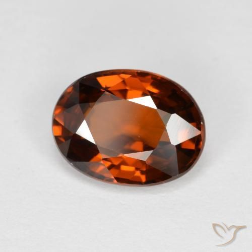 Zircon Orange rougeâtre naturelle ovale, 1.85 ct, VVS